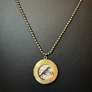 Gold Vintage Style Round Embossed Locket Necklace with Blue Bird on front 🐦‍⬛